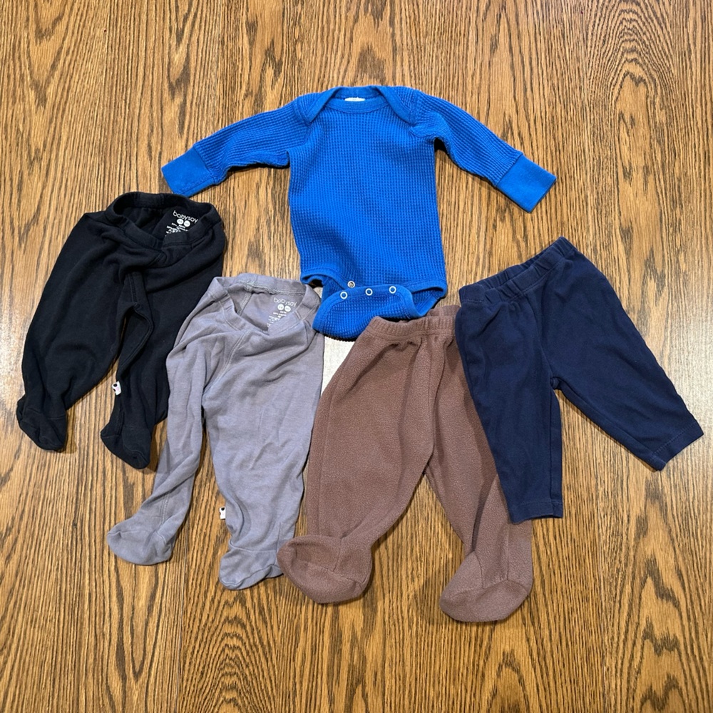 Lot of baby pants (4) and one long-sleeved onesie